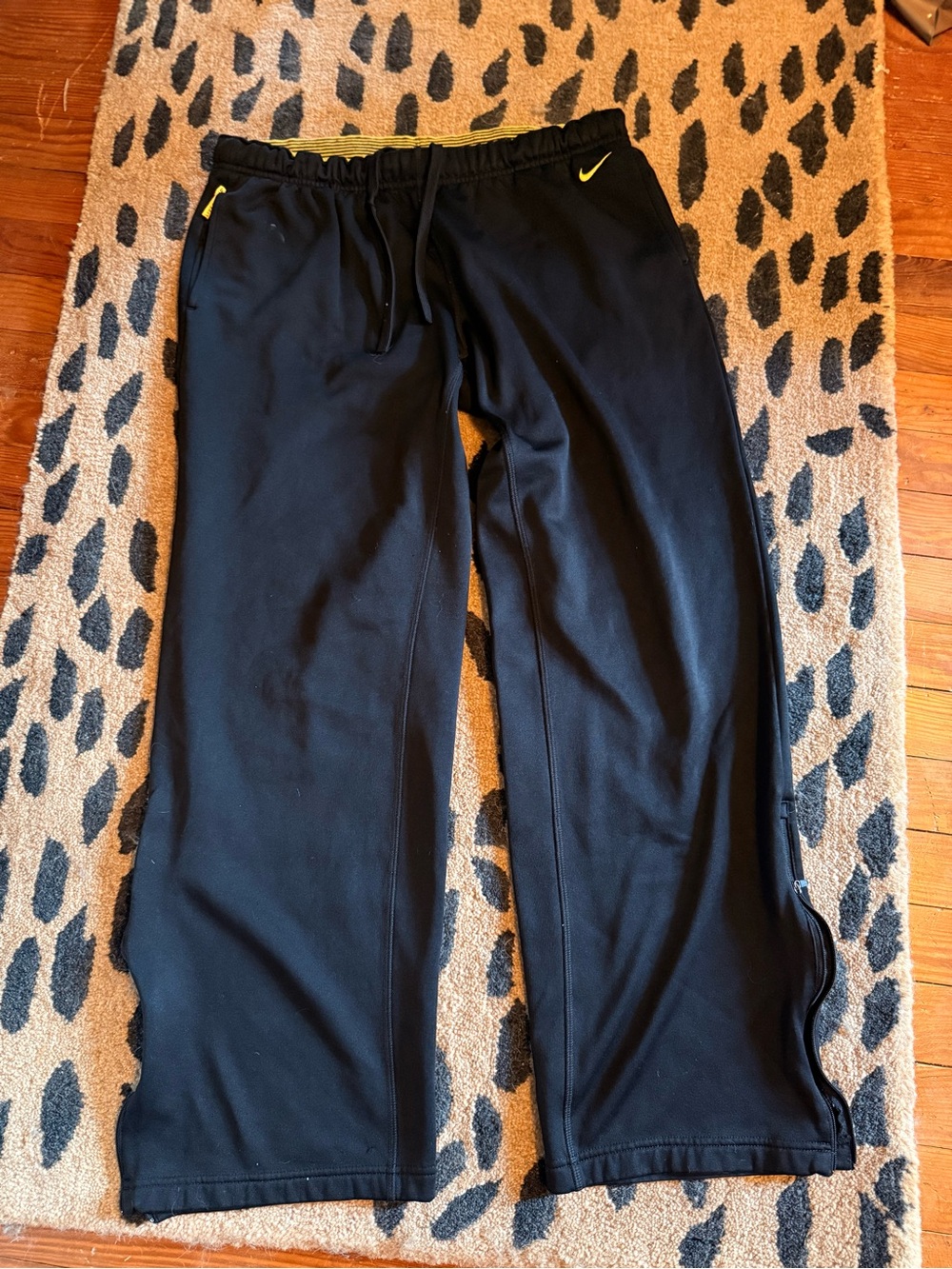 Nike Armstrong Black Joggers with Yellow Stripe Trim, Zippers Legs